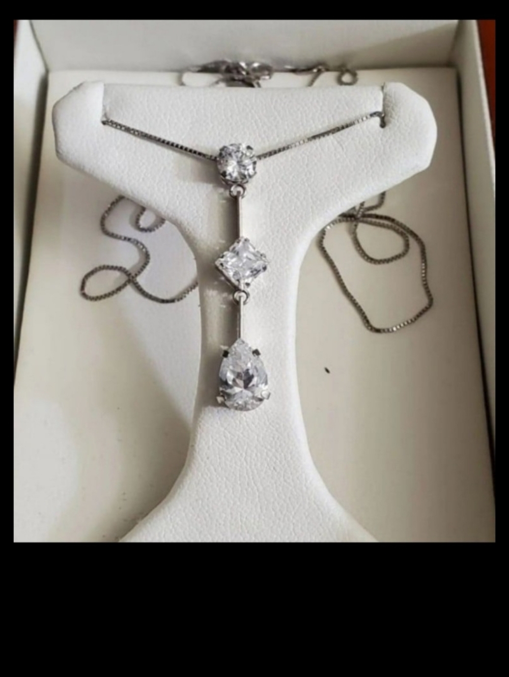 Solid 14k white gold necklace with CZ stones. Stamped 14k JCM and DQCZ. Big pend